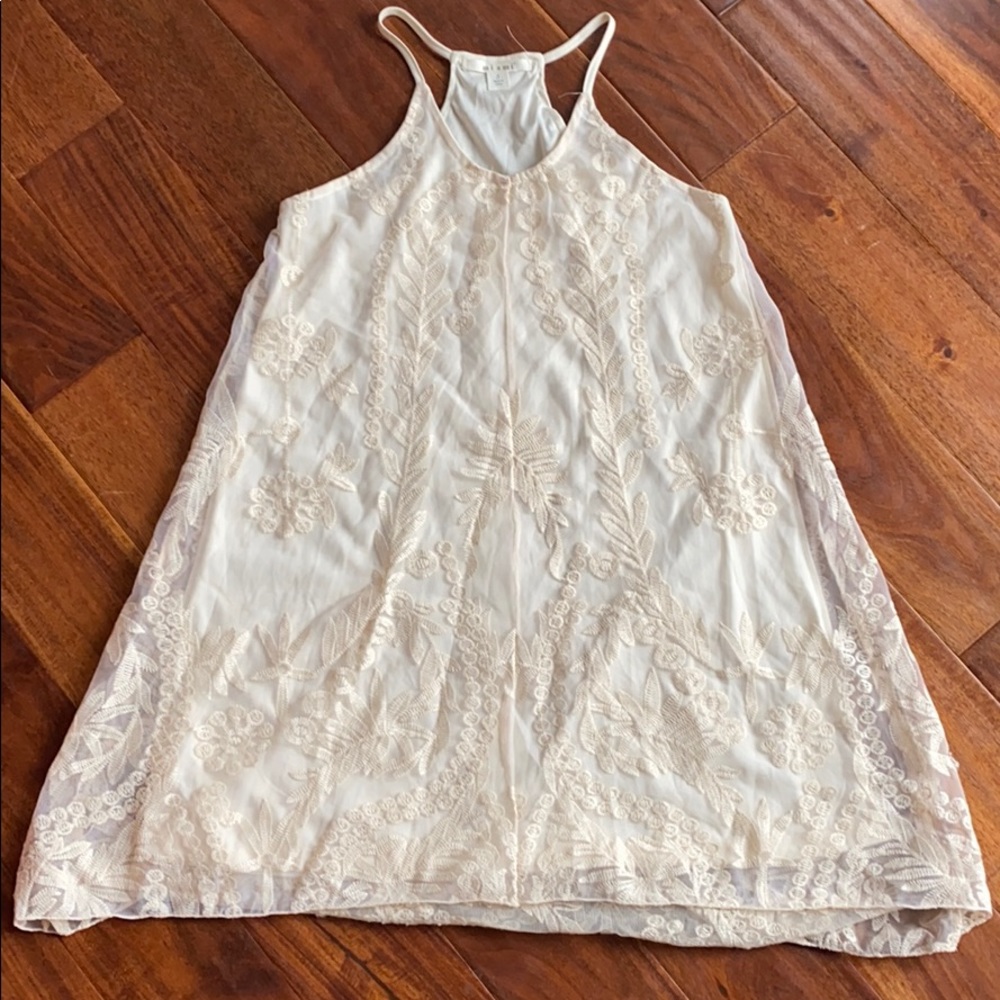 Cream lace covered dress